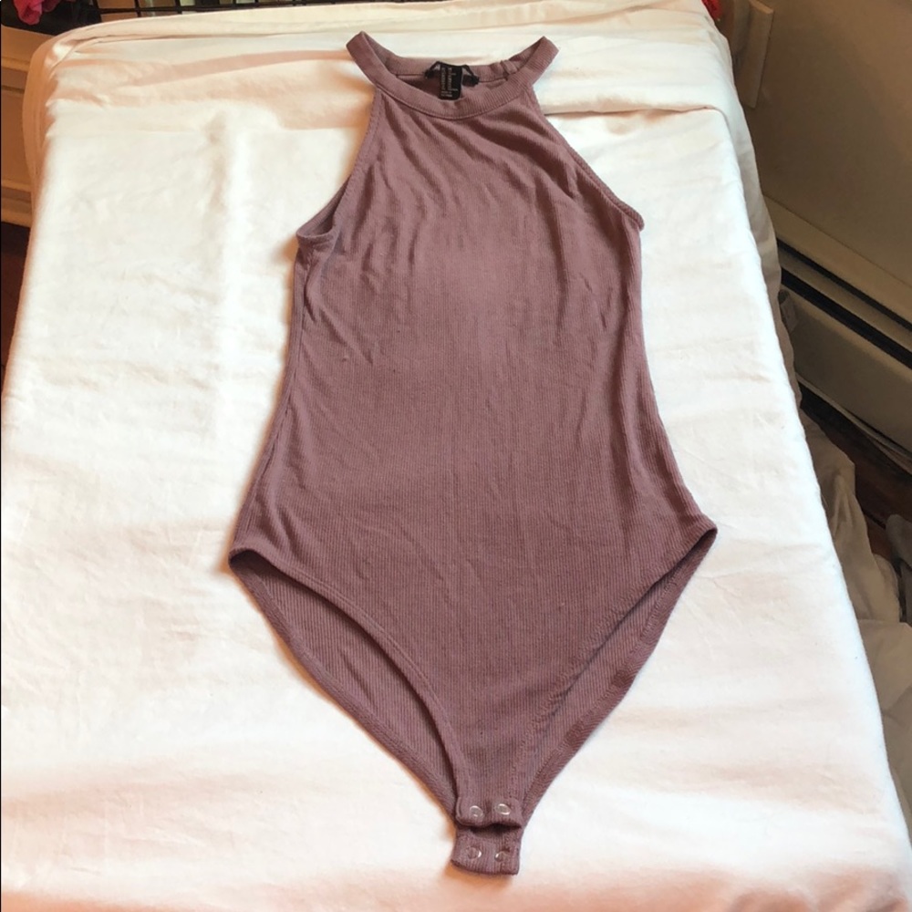 Pinkish purple ribbed halter top body suit.